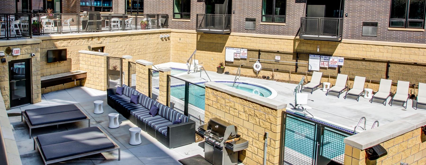 Outdoor patio and pool at The Paxon luxury apartments in Minneapolis